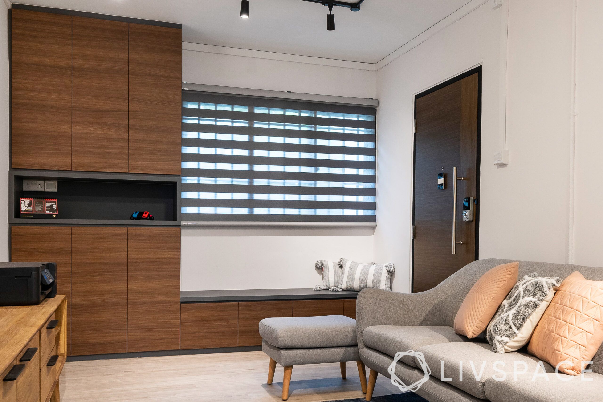 hdb interior design singapore-grey sofa-wooden cabinet-seating-blinds-wooden tv unit