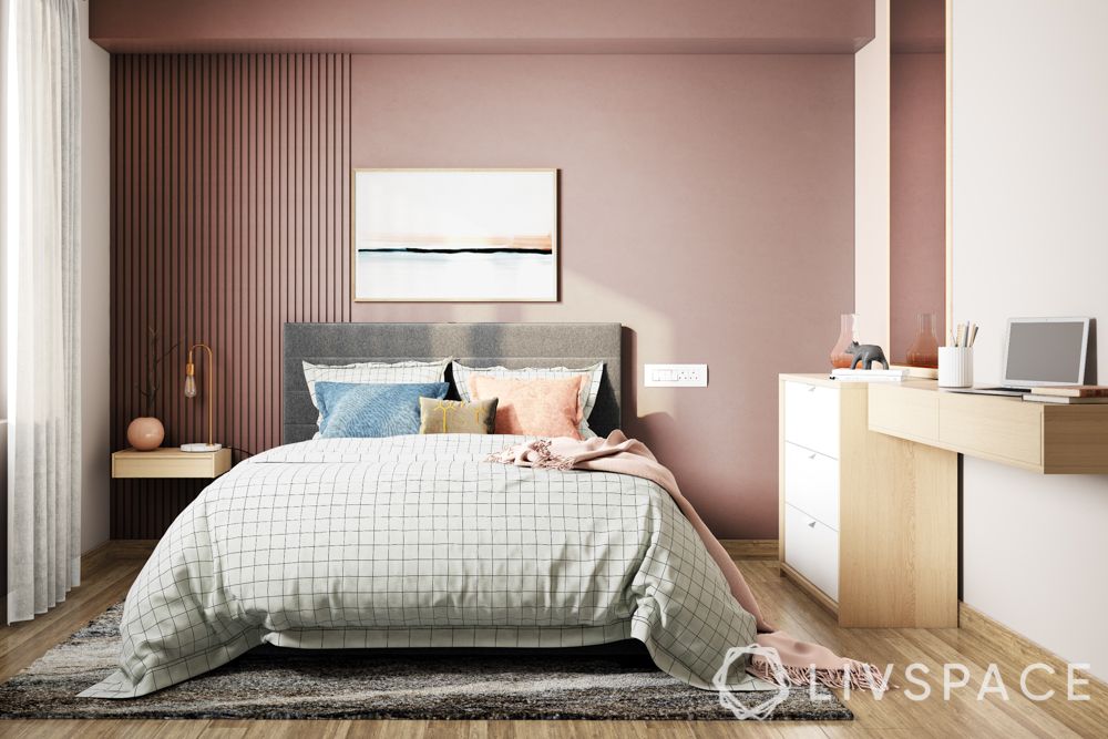 Livspace-bedroom-pink walls-study unit-bed designs