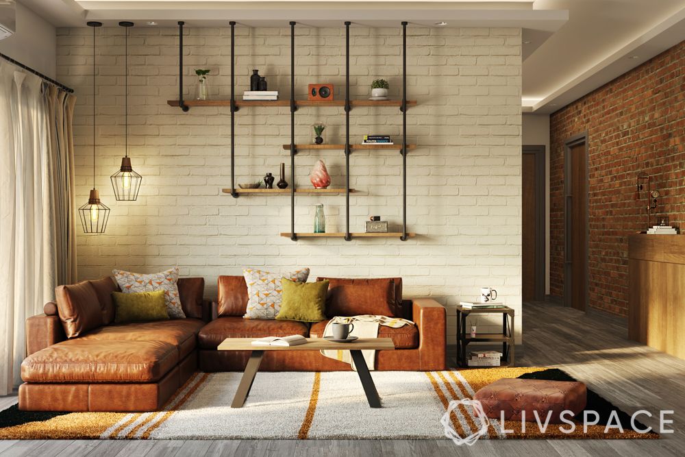 living-room-design-industrial-leather-couch-brick-wall