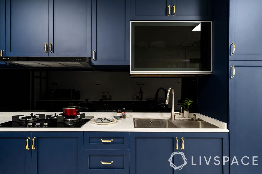 room decoration-fixtures-gold handles-ikea-blue cabinets