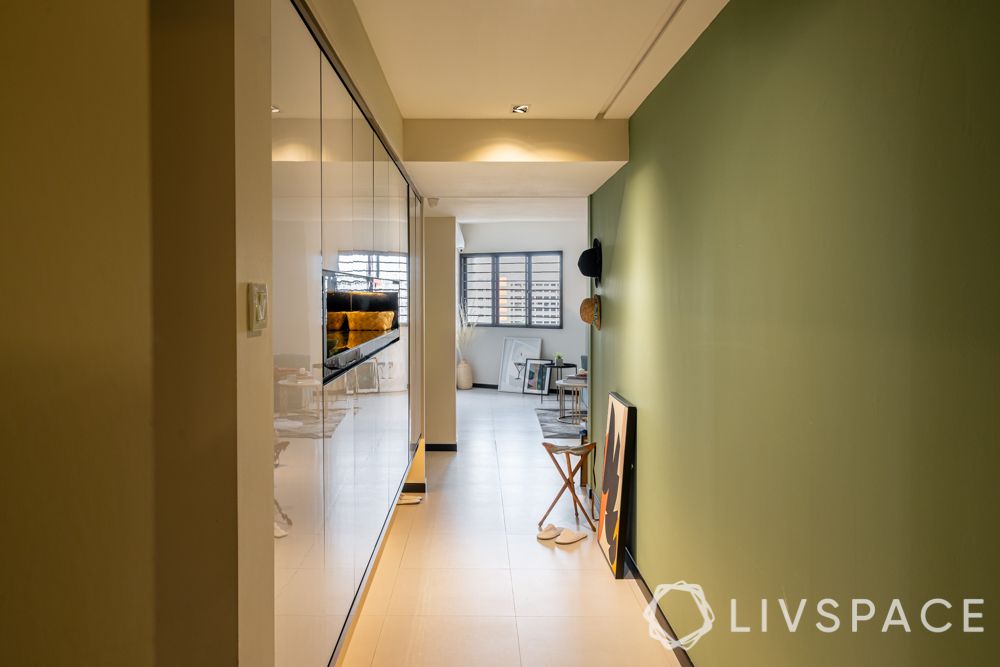 foyer-green walls-lighting-shallow cabinets