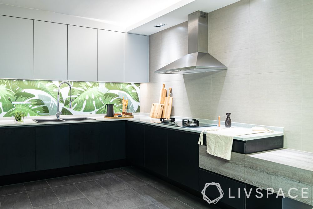 kitchen-blue bar unit-terrazzo countertop-L-shaped kitchen-open layout-leaf backsplash 