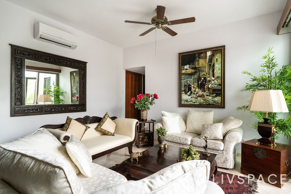 palm grove condo-living room-mirror-white upholstery-sofa