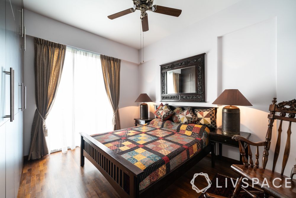 palm grove condo-bedroom-wooden bed-parquet flooring