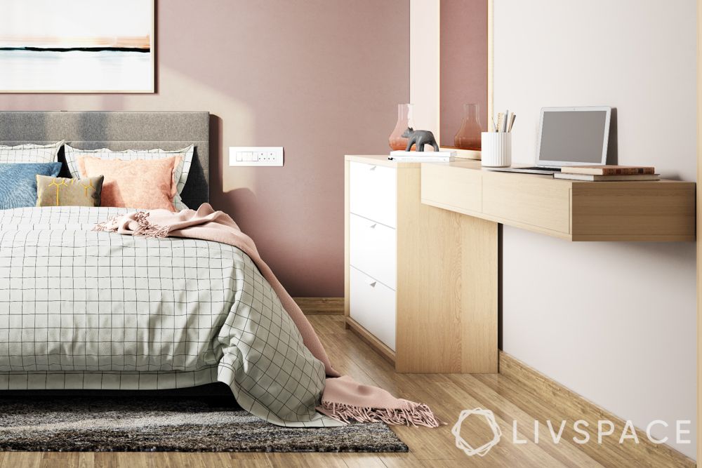 wall mounted unit-pink walls-grey bed-drawer