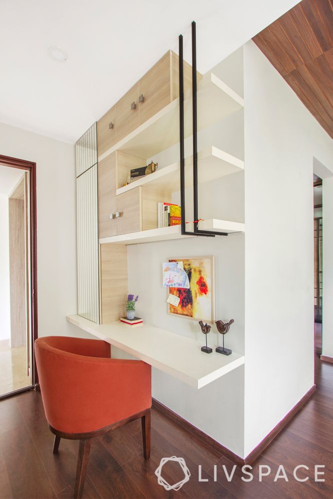hdb bedroom design with study table-orange chair-beige shelves