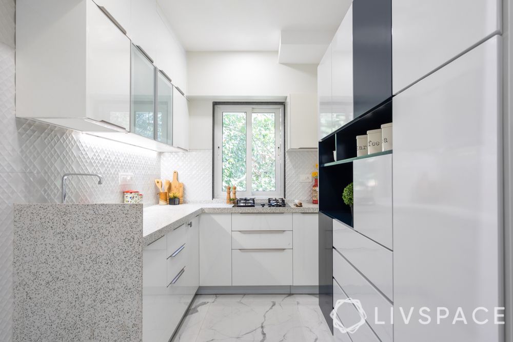 white cabinets-U-shaped kitchen-marble flooring