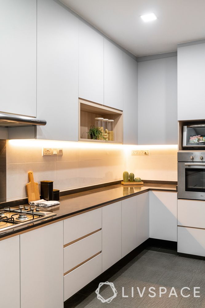 3-bedroom-condo-under-cabinet-lights-glass-backsplash