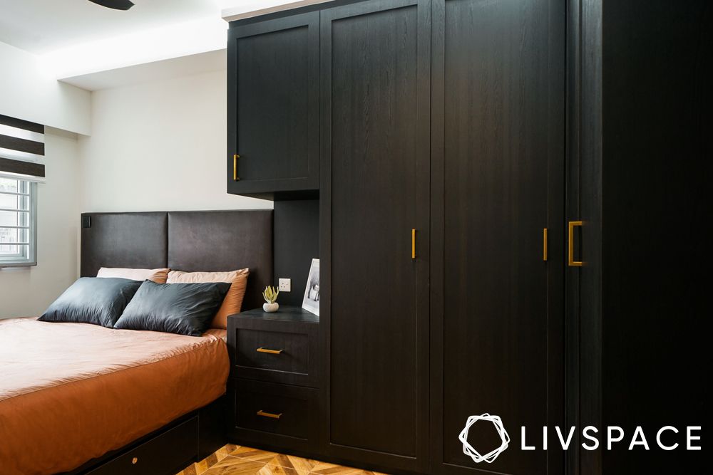 built-in-wardrobes-black-shutters-golden-handles