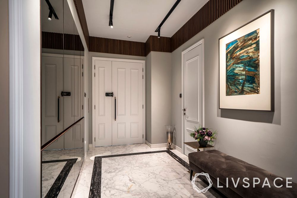 penthouse-condo-foyer-tufted-bench-laminate-panelling