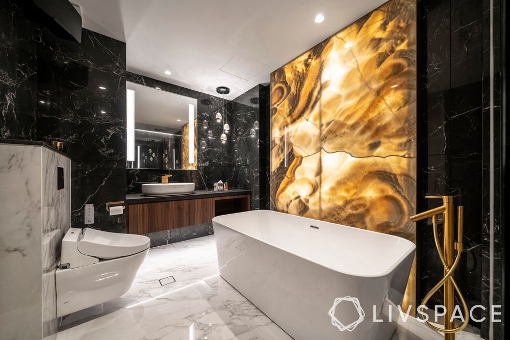 penthouse-condo-bathroom-bathtub-gold-sanitaryware