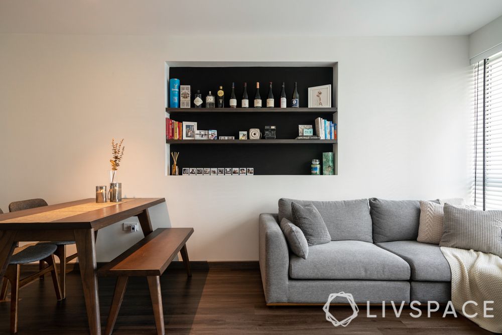 condo-living-room-design-wall-shelves-storage