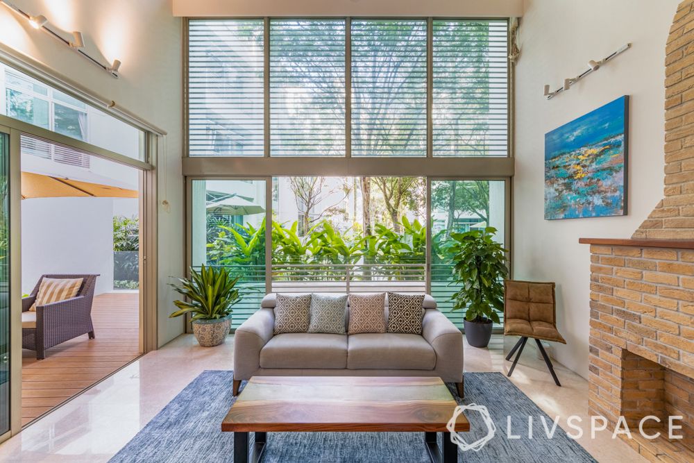 condo-renovation-singapore-living-room-wooden-table-french-windows