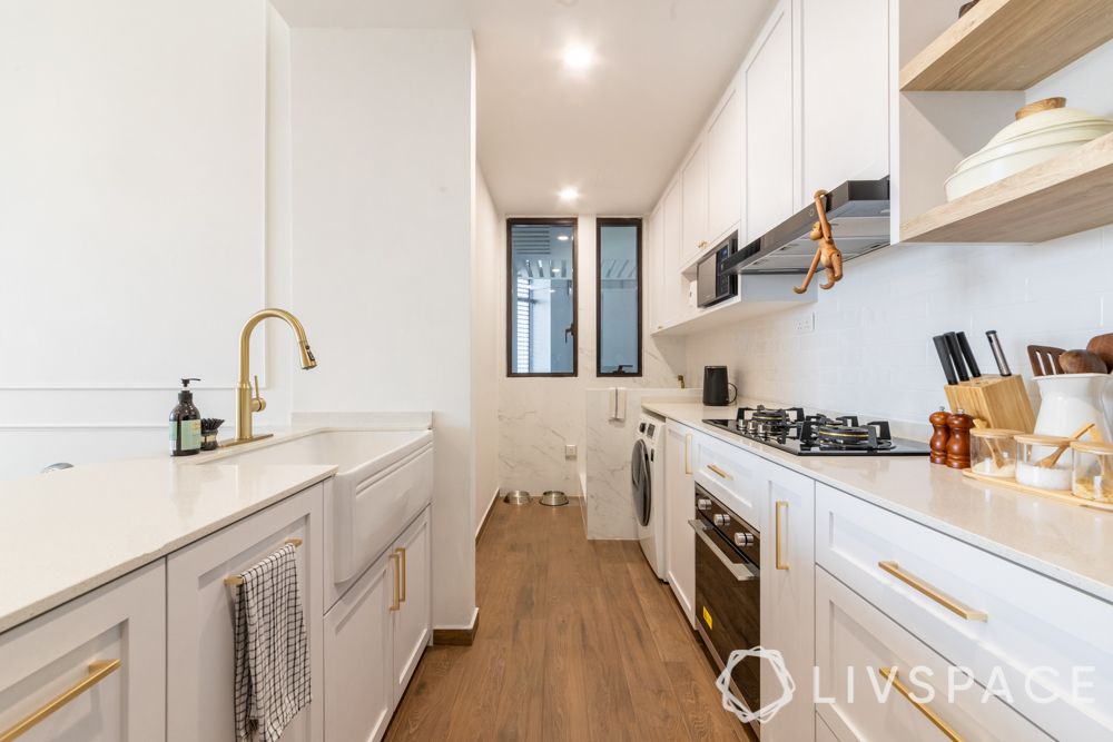 condo-renovation-singapore-shaker-style-kitchen-white-cabinetry-metal-handles