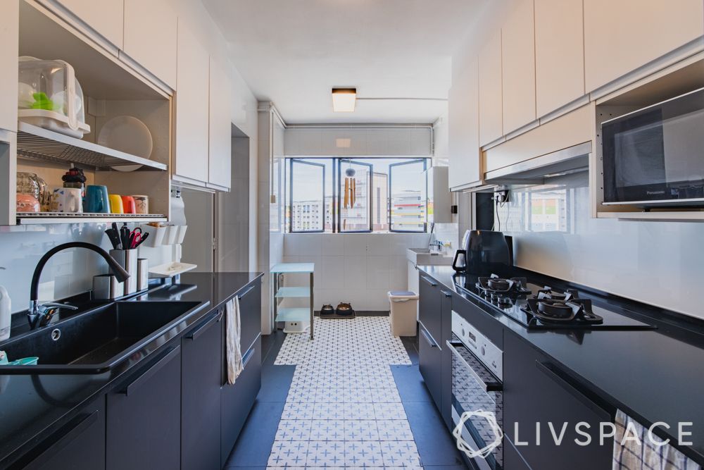 parallel-kitchen-patterned-floor-tiles-black-countertop