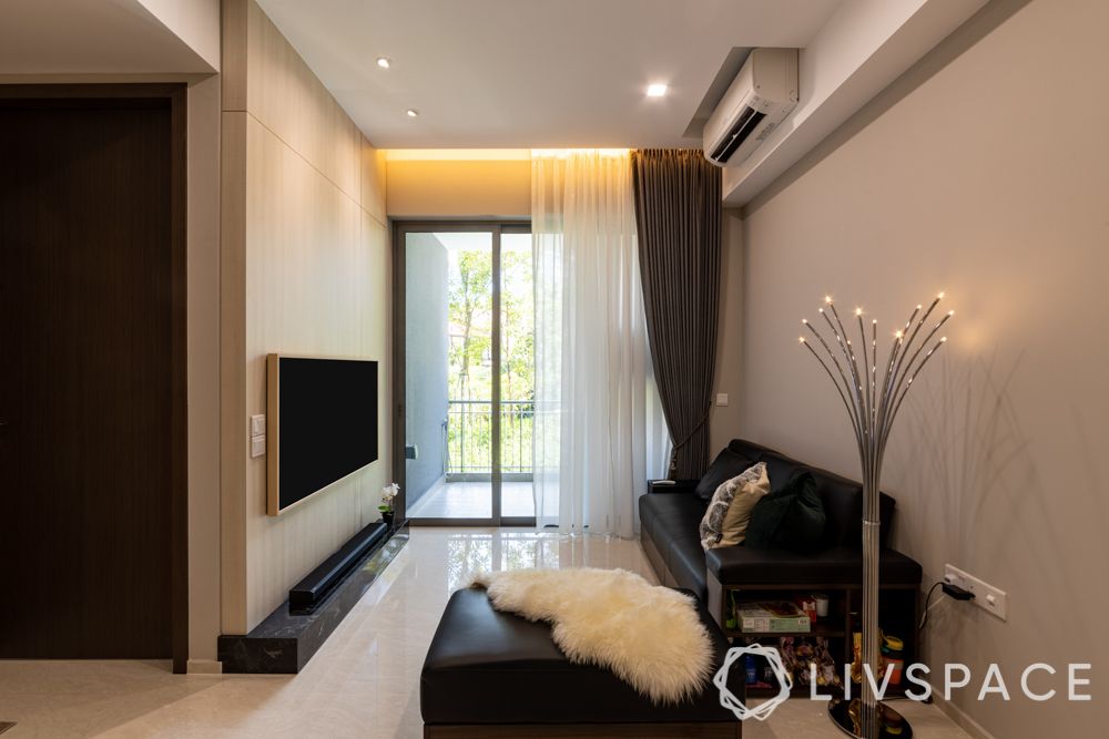 interior-design-compact-condo-living-room-black-sofa