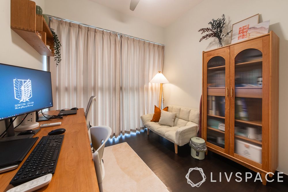 small-condo-design-ideas-study-white-sofa-wooden-desk-cabinet
