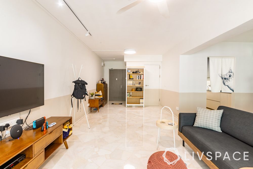 5-room-hdb-design-living-room-wooden-tv-unit-grey-sofa-white-beige-wall
