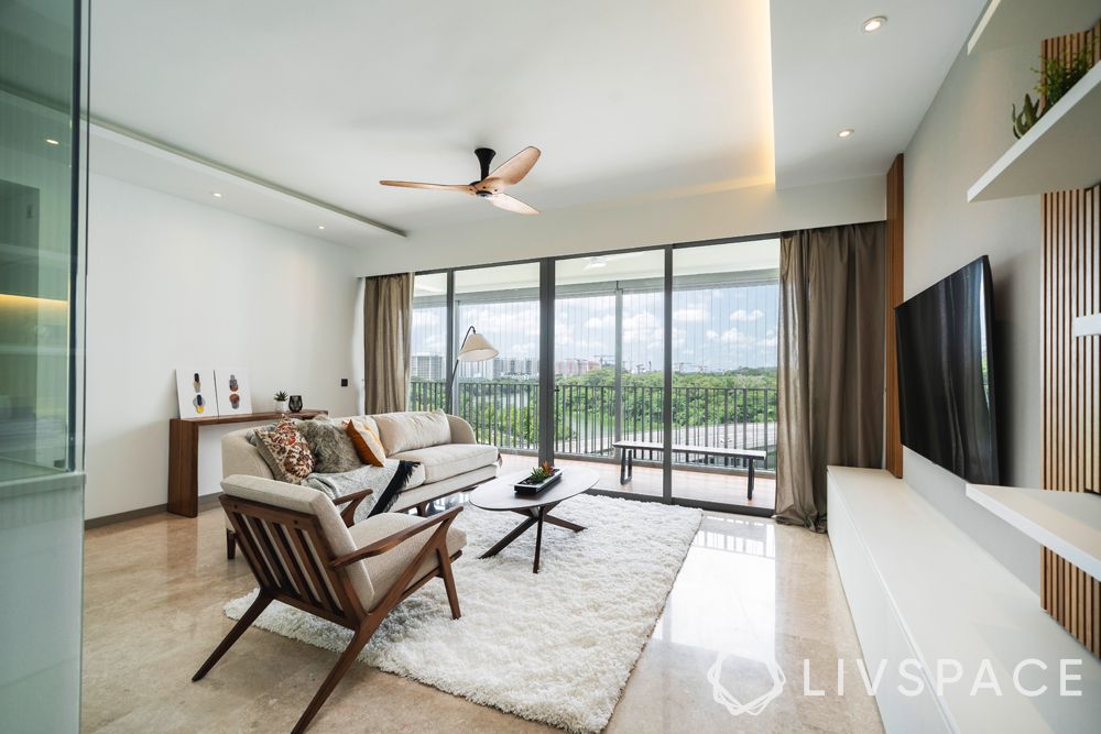 living room designer-white ceiling-white rug