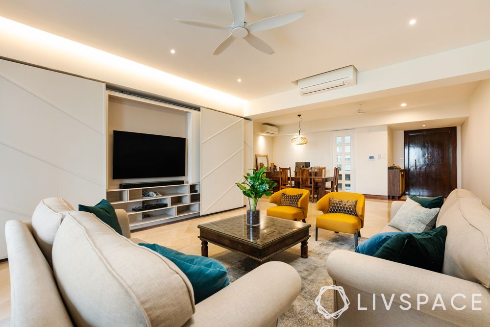 living-room-designer-beige-couch-mustard-chairs