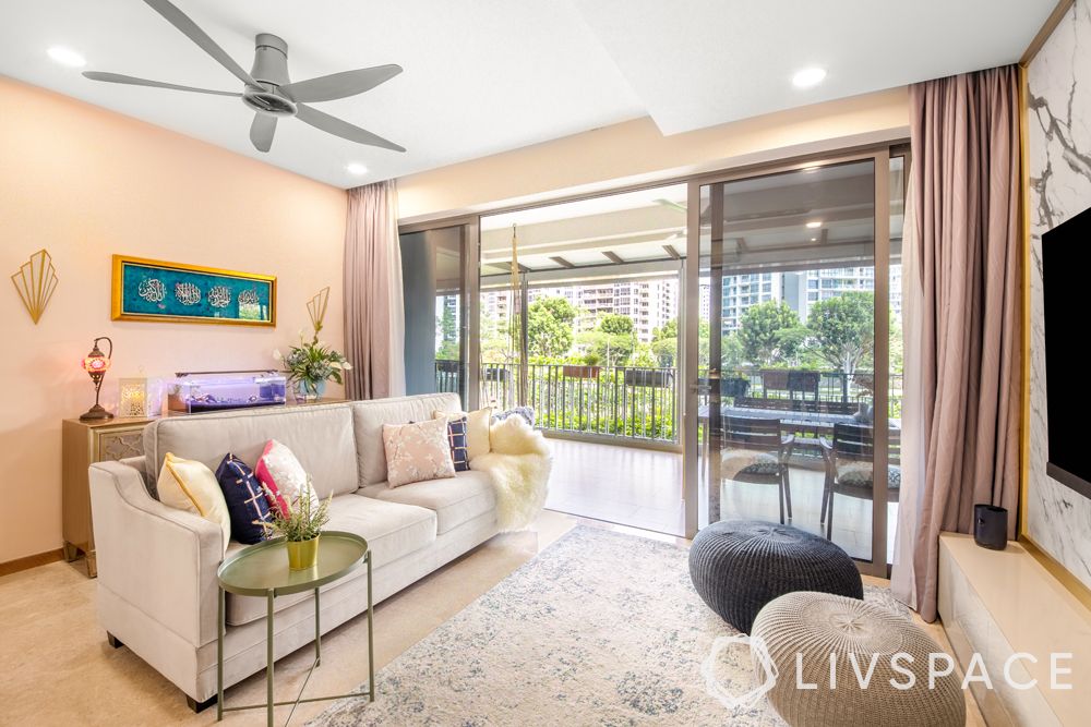 living-room-designer-cream-couch-grey-fan