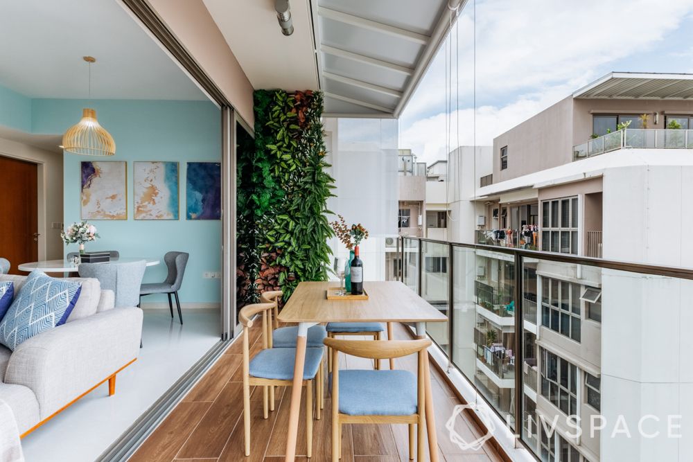 balconies-outdoor-seating-vertical-garden-wooden-table