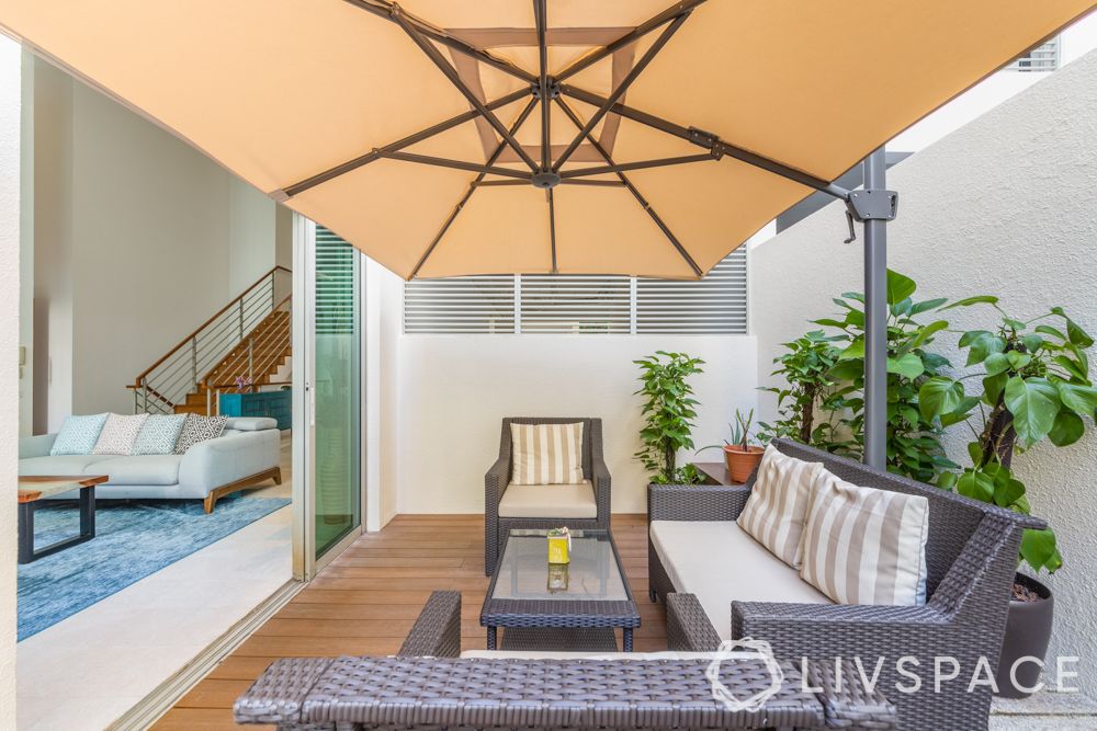 balconies-big-wooden-flooring-parasol-rattan-furniture