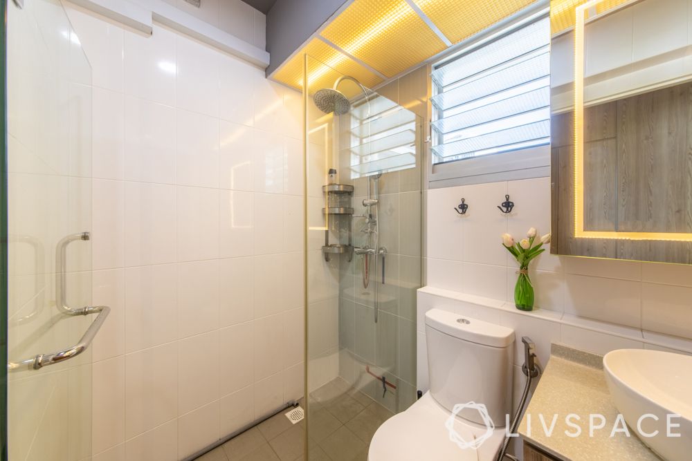 hdb-4-room-resale-renovation-toilet-glass-partition-tiled-white-wall
