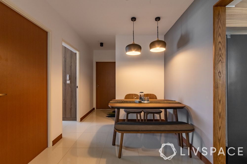 hdb-4-room-resale-renovation-dining-area-wooden-table-bench-chairs-pendant-lights