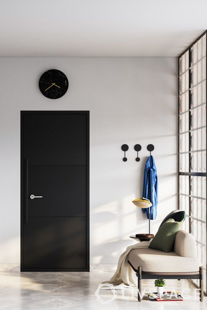 bomb shelter designs-black-painted door-wall clock
