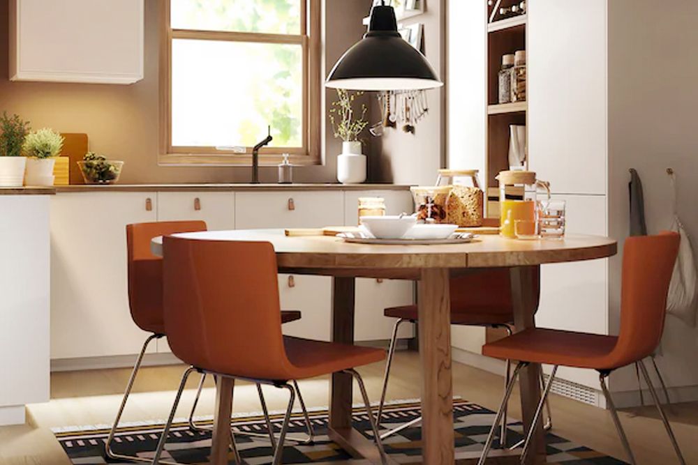 round-dining-tables-orange-chairs-kitchen