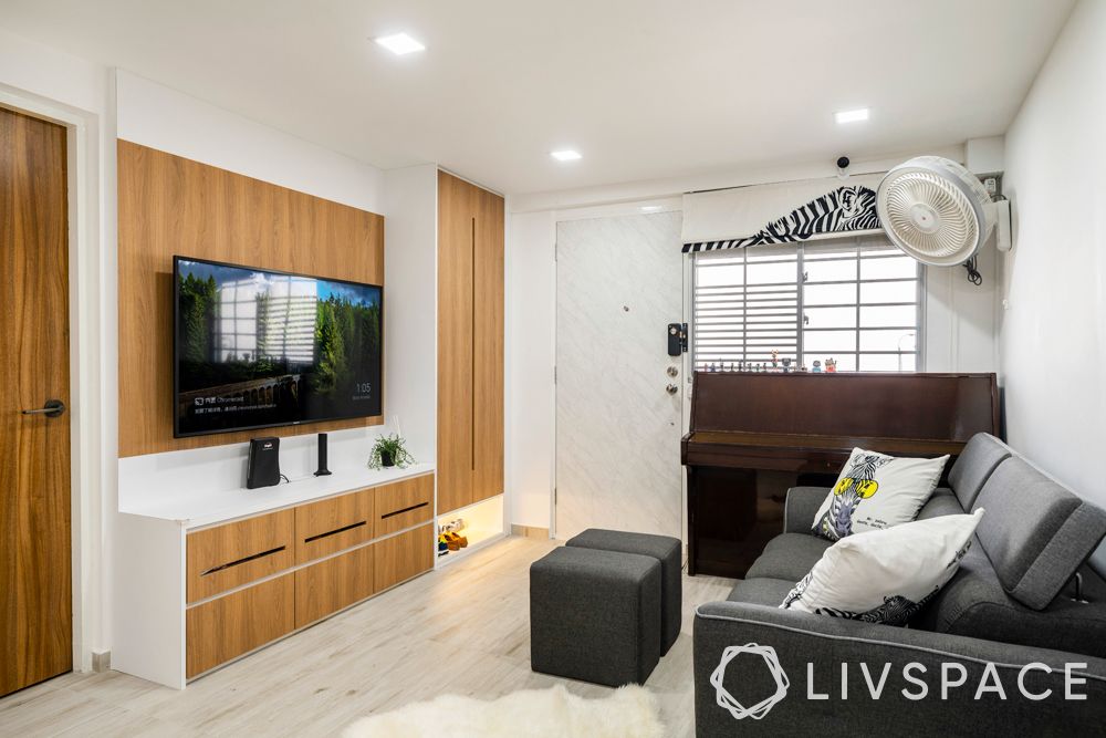 resale-3-room-HDB-design-living-room-grey-couch-wooden-TV-storage-unit-wooden-flooring