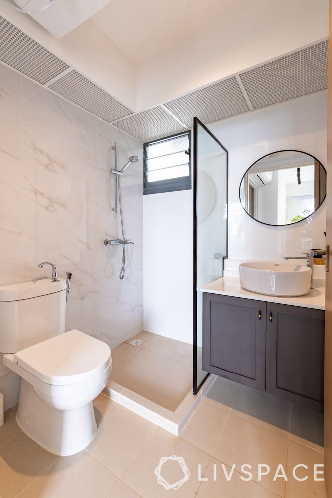 3-room-bto-renovation-toilet-blue-vanity-round-mirror-glass-partition