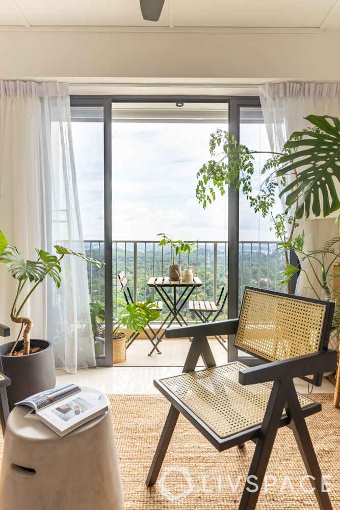 3-room-bto-renovation-living-room-wooden-rattan-chair-balcony