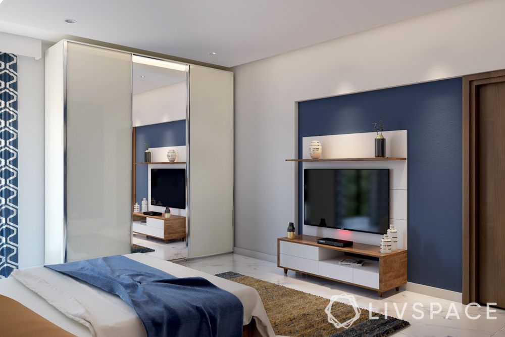 mirrored-wardrobe-white-sliding-3-door-blue-wall-TV-unit