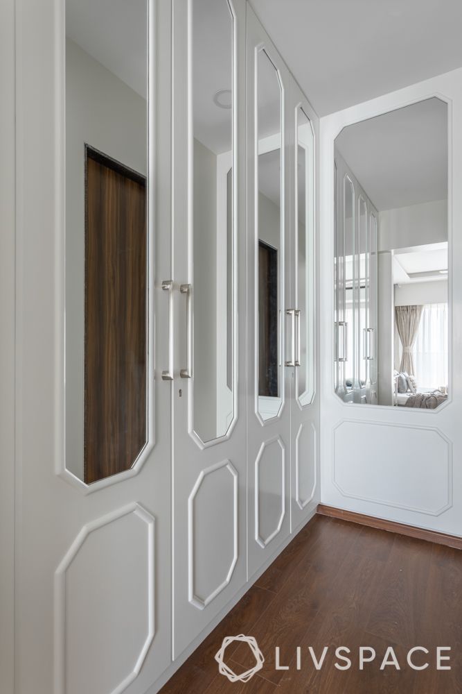 mirrored-wardrobe-white-wardrobe-wooden-flooring