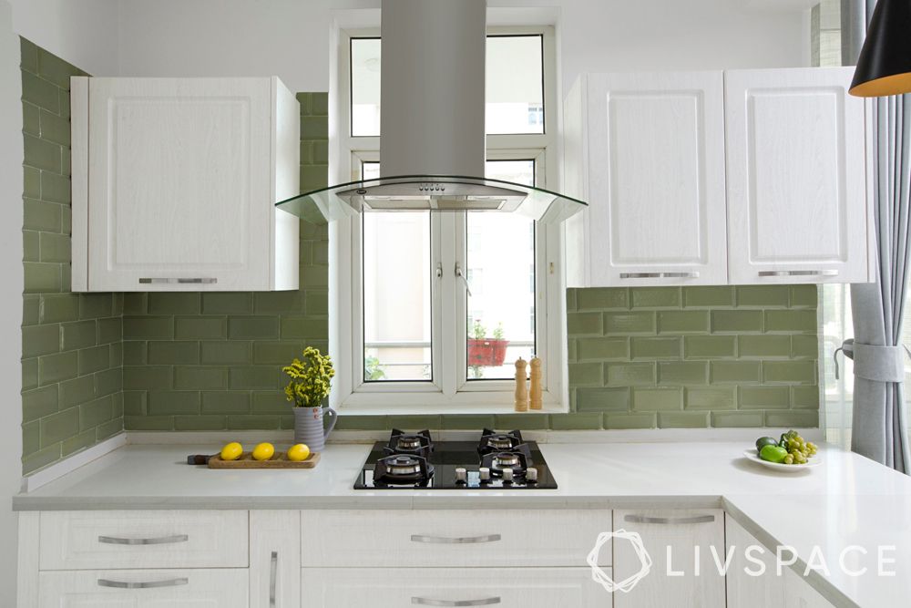 shaker-style-cabinets-white-green-backsplash-silver-handles