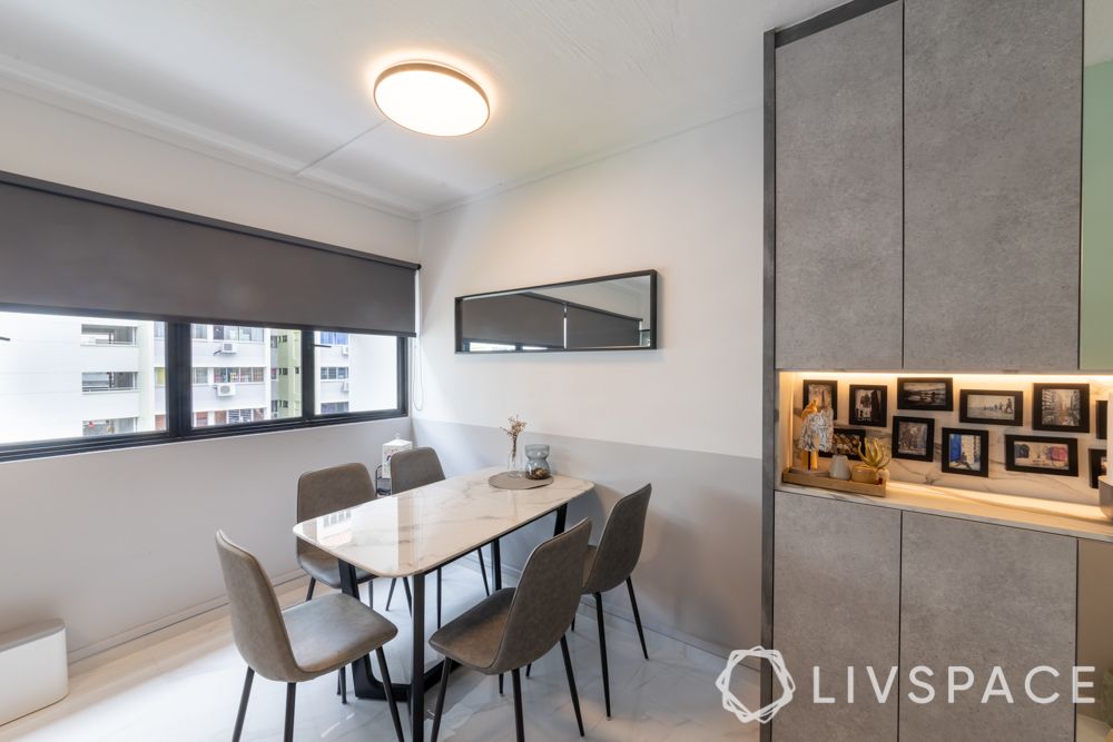 interior-decoration-marble-top-dining-table-tall-storage-unit-grey