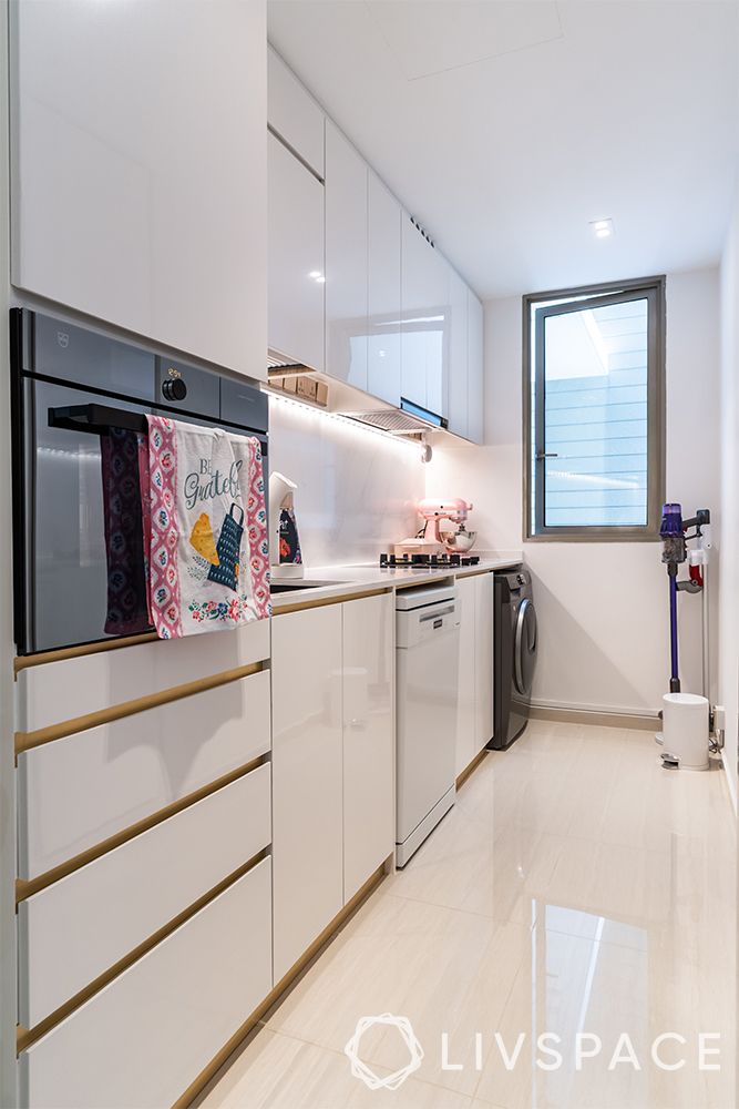 small-condo-interior-design-kitchen-one-wall-white-cabintes-recessed-lights