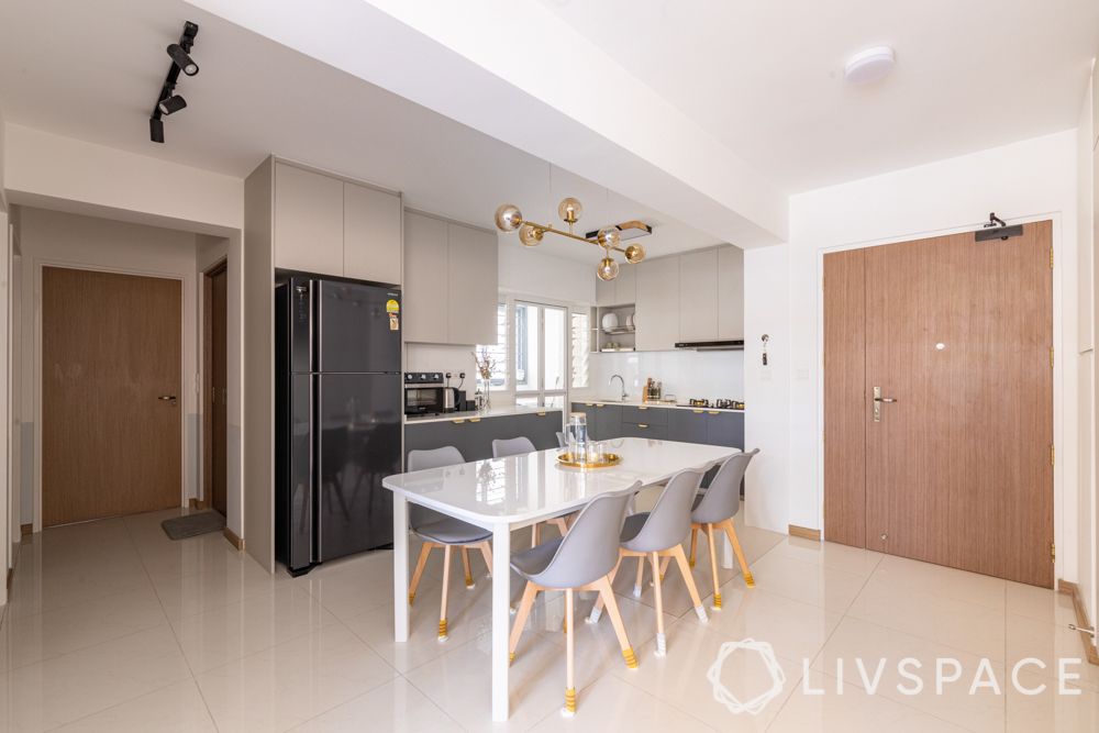 4-room-hdb-renovation-open-layout-dining-area-white-table-kitchen-chandelier