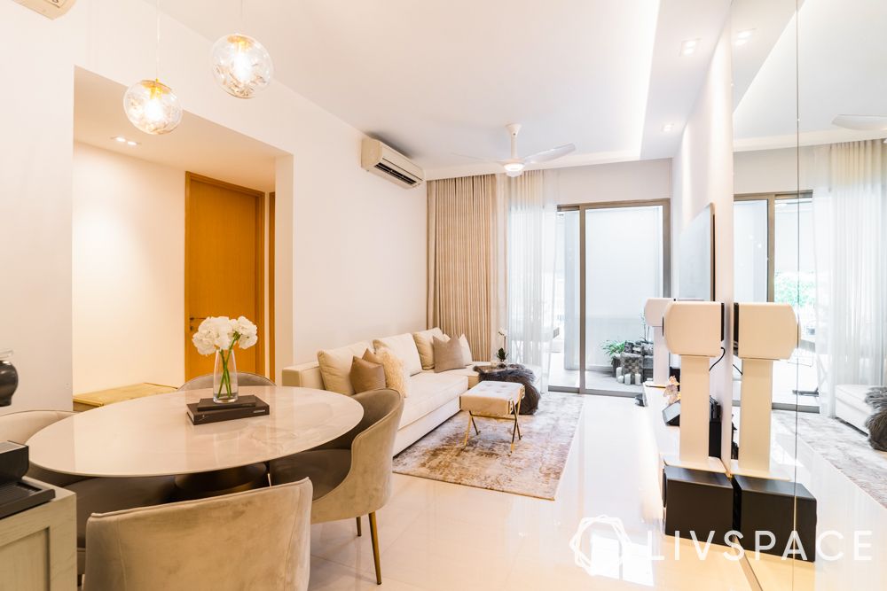 small-living-room-ideas-elegant-white-sofa-marble-table-mirror-wall