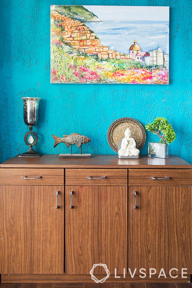 wall-painting-blue-textured-wall-wooden-cabinets-wall-painting