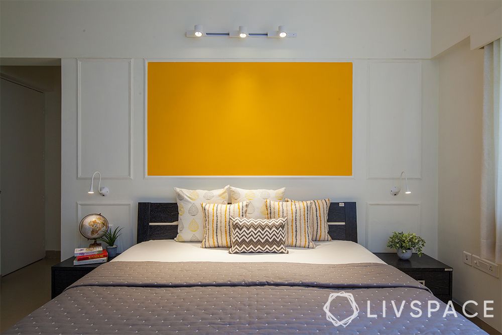 yellow-wall-paint-framework-wall-trims-track-lights