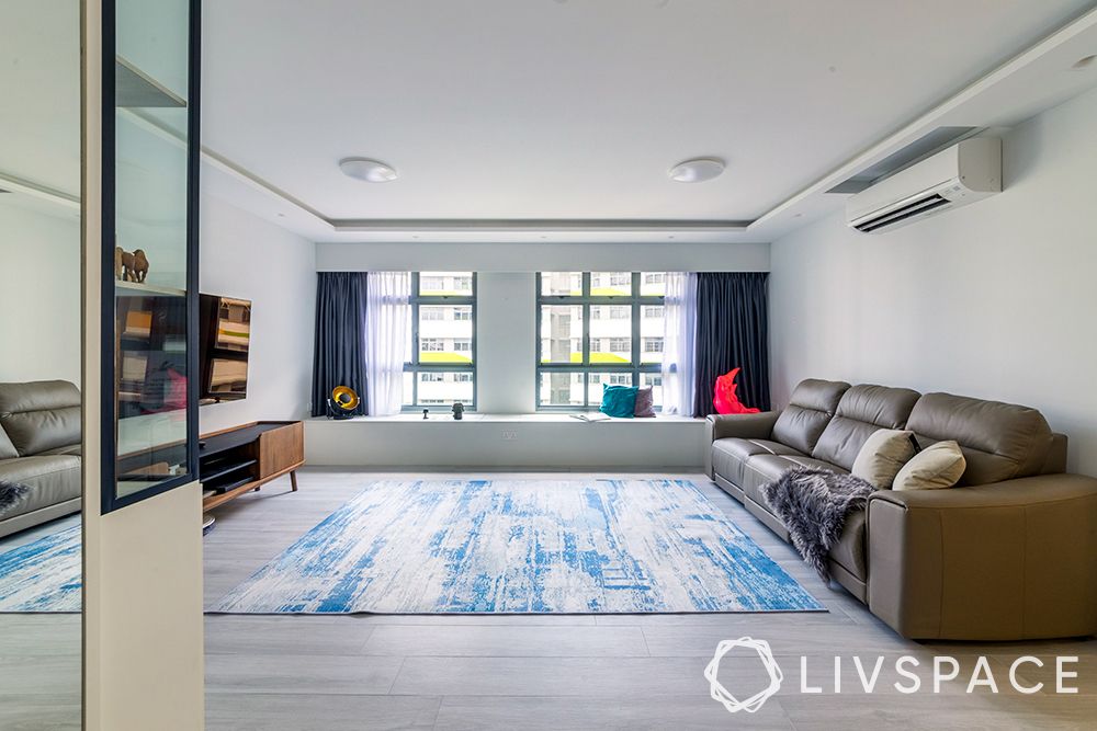 modern-contemporary-living-room-blue-rug-sofa