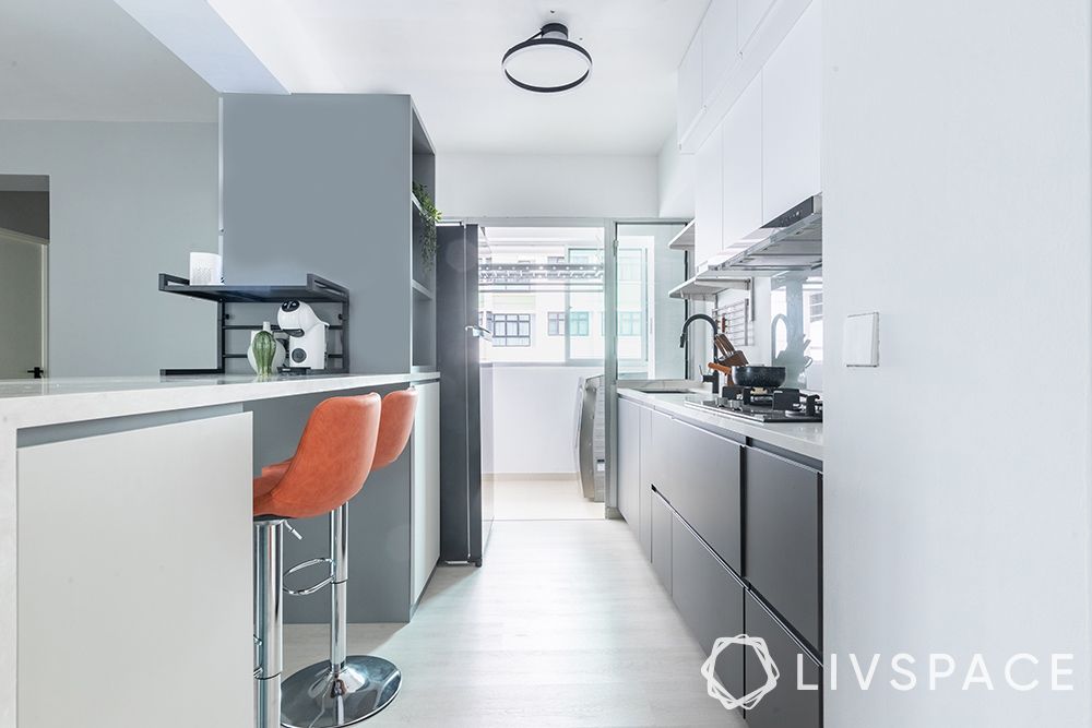 hdb-parallel-kitchen-renovation-in-grey-with-orange-accent-chairs