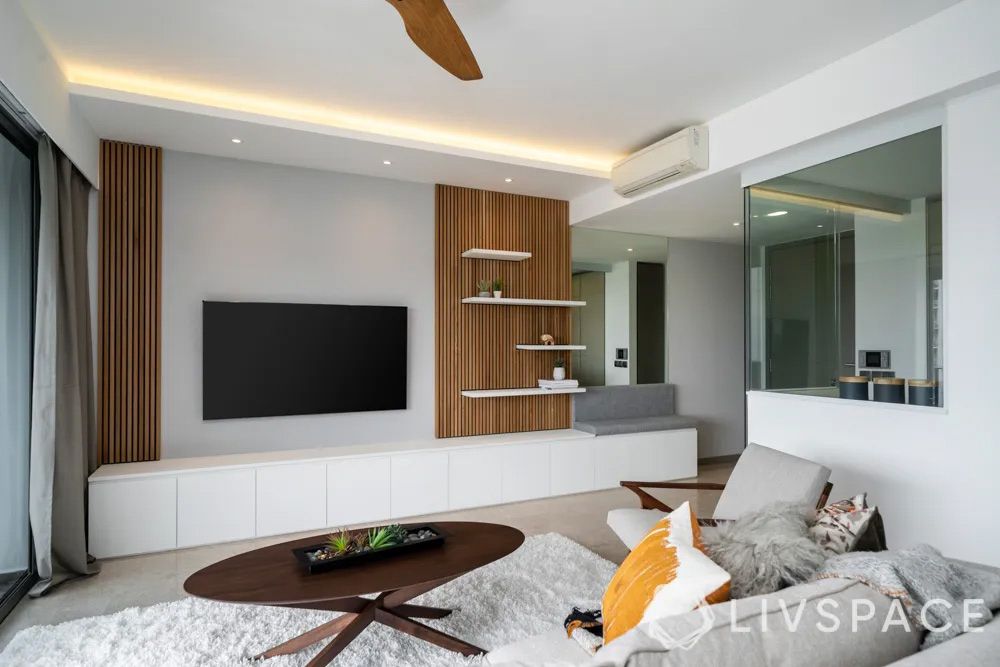 condo-interior-design-with-tv-unit-wooden-panelling-and-shelves