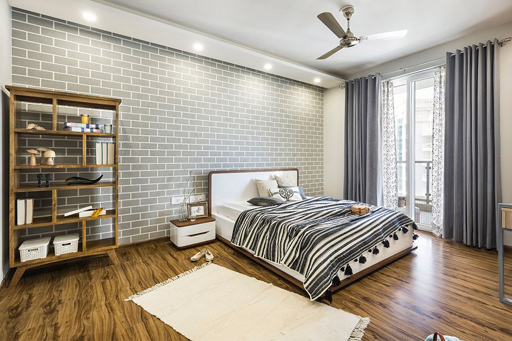 grey-brick-like-walls-with-wooden-furniture-and-flooring