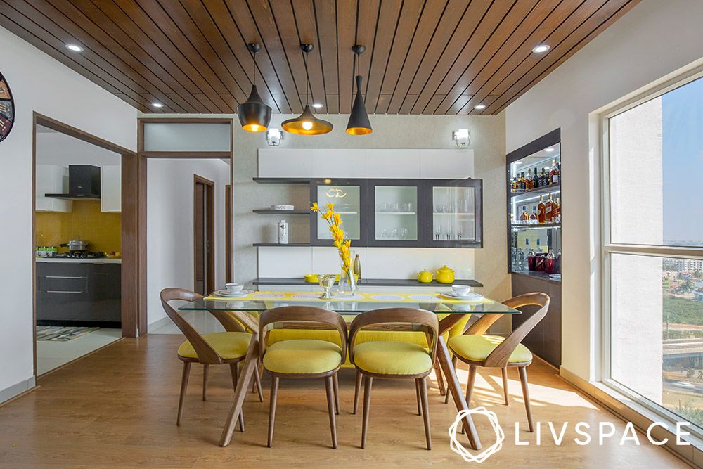 dining-room-with-clean-lines-wood-ceiling-yellow-chairs