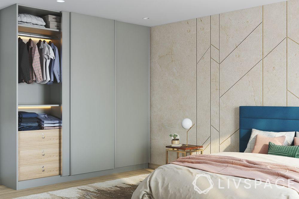grey-sliding-door-wardrobe-geometric-accent-wall-wooden-drawers